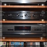 E13. Technic CD changer (model SL-PD667) and Russound speaker selector (model SDB-6.1). 